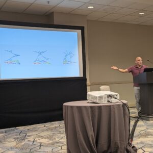 Dr. Mizuhara presenting research at a conference