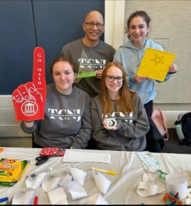 Dr. Mizuhara with some students at the TCNJ Middle School Day